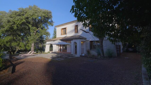 Slow revealing shot of a small modern villa in Castelnau le lez, France