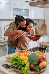Couple in love cooking together and having fun - 767685943