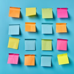 A wall covered in colorful sticky notes. The notes are in various colors and sizes, and they are arranged in a grid pattern. The wall appears to be a creative and organized space