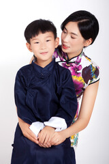 Asian mother holding son
