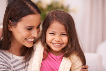 Portrait, mother and daughter with smile for hug in apartment with love, care and happiness. Home, mom and girl in lounge to relax on sofa or couch for bonding in living room of family house