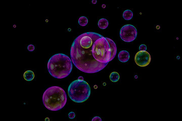 Soap bubbles composition overlay black background