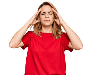 Hispanic young woman wearing casual red t shirt with hand on head for pain in head because stress. suffering migraine.