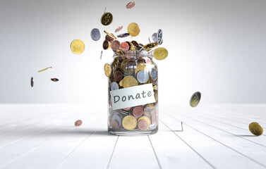 Coin in a glass jar with Donate label, Donation and Financial concept. 3D illustration