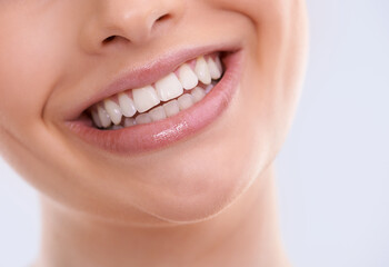 Teeth, mouth and woman with smile for dental, health and orthodontics with skin on white...