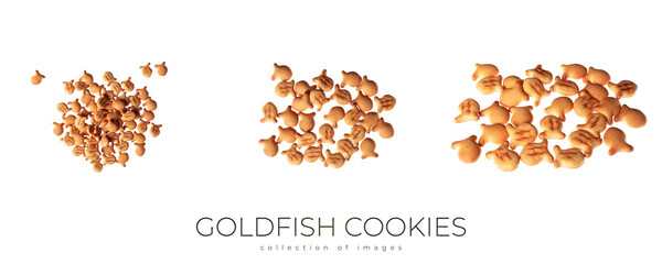 Goldfish cookies background. Closeup view of fish-shaped salted crackers. Small biscuits.