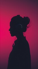 Silhouetted Woman in Headphones Listening Against Vibrant Bordeaux Backdrop - obrazy, fototapety, plakaty