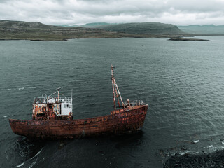 shipwreck on black beach in Iceland lost place