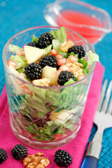 Blackberry salad with pomegranate juice.