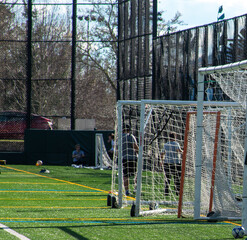 An athletic field with sports equipment
