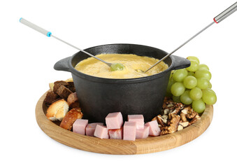 Fondue with tasty melted cheese, forks and different products isolated on white