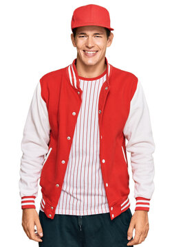 Handsome caucasian man wearing baseball uniform with a happy and cool smile on face. lucky person.