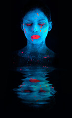 Face, neon and psychedelic reflection for creative, art and glitter with unique surreal glow....