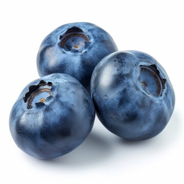 A close-up shot of a pile of blueberries stacked on top of each other, showcasing the vibrant colors and textures of the berries isolated on white background.
