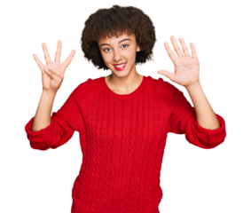 Young hispanic girl wearing casual clothes showing and pointing up with fingers number nine while smiling confident and happy.