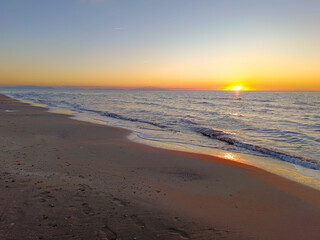 Seascape at sunset of the beach of Marina di Castagneto Carducci Tuscany Italy