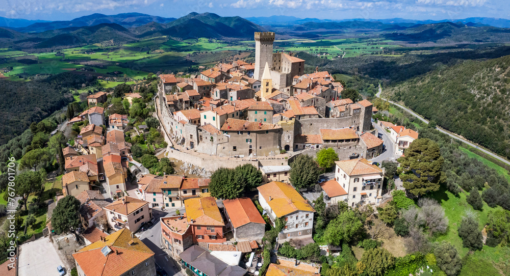 Poster Italy travel and landmarks. Capalbio - charming small traditional top hill village (borgo) in Tuscany. Grosetto province. considered one of the most beautiful villages of Italy. aerial paniramic view