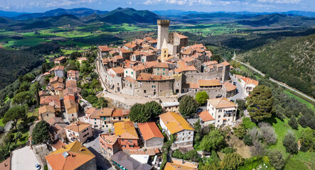 Italy travel and landmarks. Capalbio - charming small traditional top hill village (borgo) in Tuscany. Grosetto province. considered one of the most beautiful villages of Italy. aerial paniramic view - 767801706