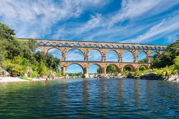 Photo sur Plexiglas Pont du Gard The Pont du Gard is an ancient Roman aqueduct, that is depicted  on five euro note. France, summer 2022.