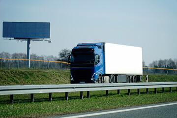 Truck on a highway - front view