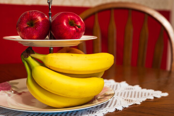 Fresh ripe banana fruit on living room table