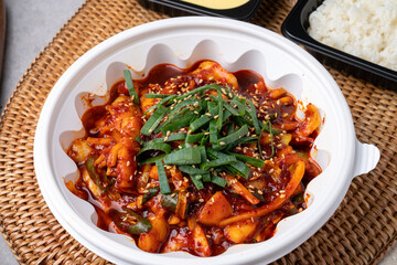 Korean food, spam, pork, spicy, red pepper paste, stew, squid, stir-fry, side dishes, rice, egg roll, beans, perilla leaves, seaweed