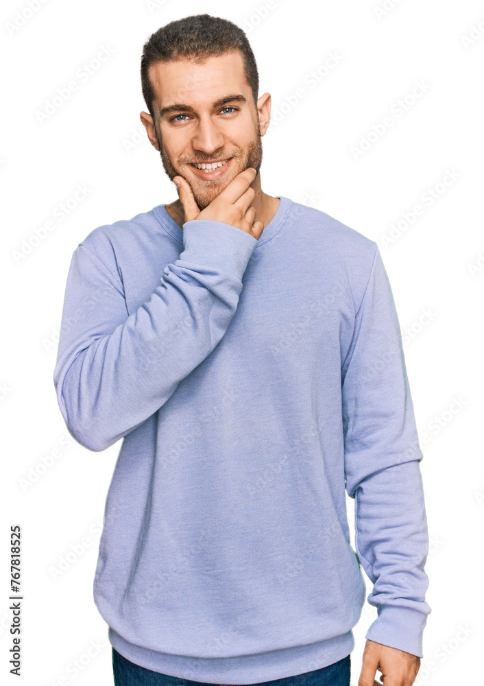 Poster Young caucasian man wearing casual clothes looking confident at the camera smiling with crossed arms and hand raised on chin. thinking positive.