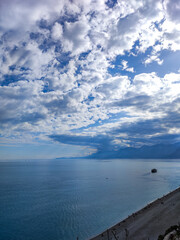 Fototapeta premium clouds over the sea, konyaalti beach, antalya,turkey 