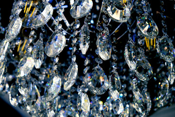 Crystal chandelier light equipment in the night, high contrast, full frame