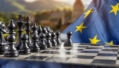 Chess board pieces on a blurred background of the European Union flag and a hilly landscape.