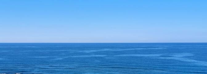 Beautiful blue sea and large calm waves .Travel Background.