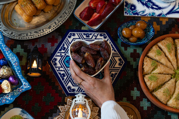 Ramadan Iftar Table. Muslim Family Having Dinner At Home. The fast ends with Dates or Turkish Pita. Ramadan Feast Celebrations, Eid Mubarak Concept Üsküdar Istanbul, Turkey (Turkey) - obrazy, fototapety, plakaty