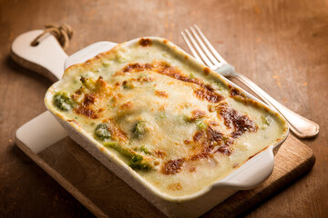 oven broccoli with mozzarella and bechamel - 767835189