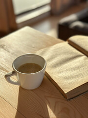 cup of coffee and book, sunrise and sunset coffee