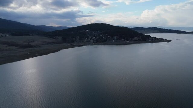 Drone shot of Batak Reservoir Lake in the Rhodope Mountains in the Batak municipality, Bulgaria
