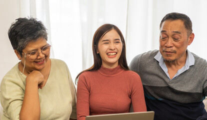 Portrait enjoy happy smiling love asian family.Senior mature father hug with elderly mother and young adult woman play laughing and having fun together at home.insurance concept