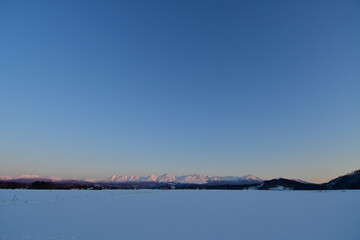 snow and mountain landscape kokkaido dusk dawn sunset