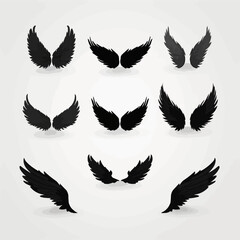 Fototapeta premium Black wings icon set. Wings icons. Collection badges of wings. Bird wings, angel wings elements.
