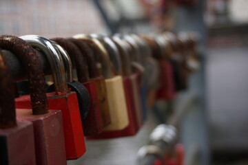locks on the bridge in a old town