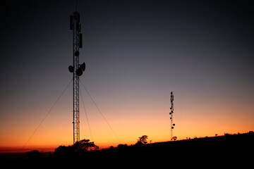 Silhouette of Cellphone mast at sunrise