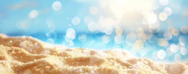 Beautiful summer background with a blurred sandy beach and blue sky with a bokeh effect - obrazy, fototapety, plakaty