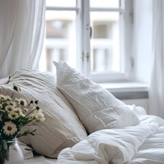 Close up of bed with white bedding against window. Scandinavian interior design of modern bedroom.