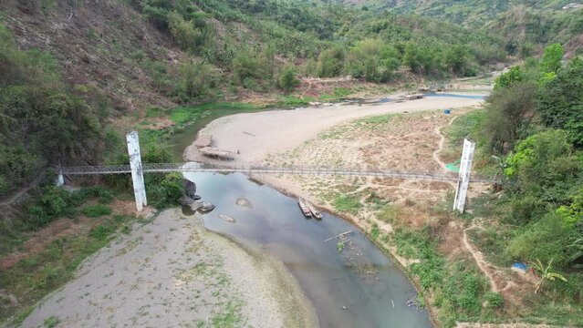 Villager cable bridge in Mabau, Bintong Bukawe, Mar  2024 before sink in the reservoir, Rizal Philippine.  