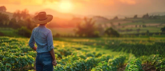 Foto auf gebürstetem Alu-Dibond Heringsdorf, Deutschland A woman farmer in the fields of her farm