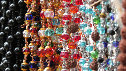 Colorful decorative pearl chains displayed in a shop