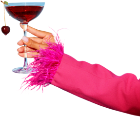 Woman's hand holding glass with sweet drunk cherry cocktail decorated with berry against transparent background. Concept of party, relax, alcohol, holidays, celebrations, Friday mood.