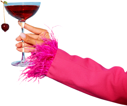 Woman's hand holding glass with sweet drunk cherry cocktail decorated with berry against transparent background. Concept of party, relax, alcohol, holidays, celebrations, Friday mood.