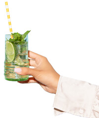 Lady's hand holding glass of cold, refreshing mojito with lime, mint leaves and bright straw...