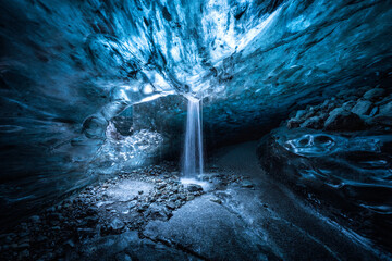 A wonderful view of Ice cave. with a center. of waterfall on Jokulsarlon National park,Iceland