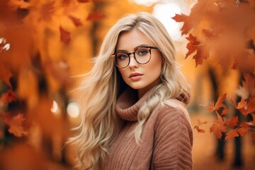 Attractive blonde hair woman wearing glasses against fall autumn ambience background, autumn scene, orange leaves